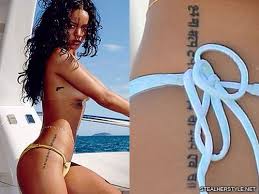 One of rihanna's many hobbies is getting herself tattooed. Rihanna S Tattoos Meanings Steal Her Style