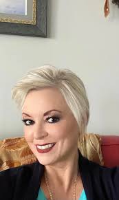 This is me as I grew my hair out natural keep it black for over 35 years I  am now 71 would never turn back to black hair. Might cut it short