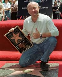 On this day in 1999, Phil Collins' star was added to the Hollywood Walk of  Fame. ⭐️ During the unveiling ceremony, which Phil attended with his  daughters, Lily and Joely, he said: “