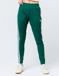 It quickly became an iconic adidas street style. Adidas Sst Track Pants Green 0e273b