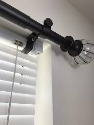 Well then, take a look at these curtain rod brackets to buy one and solve your problem! The Nono Bracket Company Nono Bracket Mini Inside Mounted Blinds Curtain Rod Bracket Attachment For Mini Blinds Brown