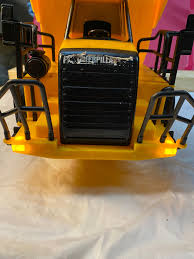 Image result for Caterpillar Yellow 1995 Fleet