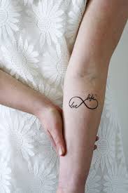 The tattoo seems wholly natural and aesthetic. Temporary Tattoo Infinity Symbol Love Life