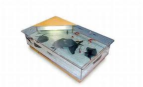 Resting on a black acrylic pedestal, each coffee table aquarium is illuminated from below a bed of blue glass gravel. Most Elegant Coffee Tables And Creative And Space Saving Ideas For Home Decor With Built In Aquarium Hometone Home Automation And Smart Home Guide