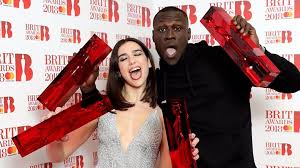 South london grime superstar stormzy beat ed sheeran to the main prizes in a surprise result at the brit awards. Brit Awards 2018 Stormzy Scoops Ed Sheeran To Win Top Prizes Starr Fm