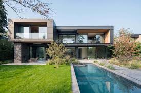 A modern 4 bedroom villa inside a safe gated community, next to a practice zone for golf and close to. Modern Villa In Amsterdam Offers Fabulous Indoor Outdoor Connectivity