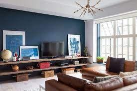 Inside An Industrial Chic Flat In London Blue Accent Wall Living Room Feature Wall Living Room Accent Walls In Living Room