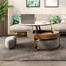Add two wing chairs facing each other close to fireplace to allow for conversation in area, as well as an option, faces two oversize chairs and coffee table with ottomans underneath to focus and place one end or ornamental table in between, easily. Modern Round Tea Table Oddity Trend