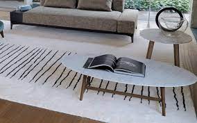 Imitating the blue waves of the mediterranean sea, this table, unlike most that have a river flowing over the tabletop, is predominantly water with a small mass of land (wood) floating in the middle. Coffee Side Tables Kitchen Studio Living More