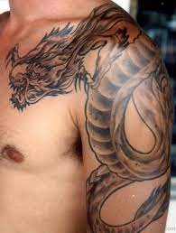 Shoulder tattoo for black men. 30 Badass Shoulder Tattoos For Men