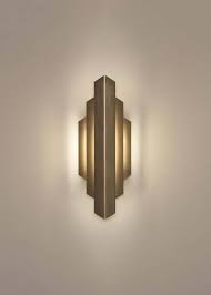 These art deco era chandeliers, ceiling light and wall sconce are equally at home in a traditional setting. Deco Sconce Gold Vertical Geometric Modern Led Sconce Light Fixture In 2021 Art Deco Light Fixture Sconce Light Fixtures Art Deco Lamps