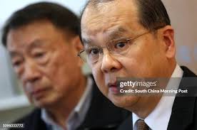 Professor Chow Wing-sun and Hong Kong Secretary for Labour and... News  Photo