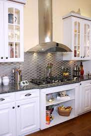 Properly sealed, this material won't stain, absorbs heat, and gives your kitchen a beautiful and sophisticated finish. 15 Chic Metallic Kitchen Backsplash Ideas Shelterness