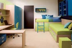 Kids table for art and crafts, contemporary space saving design for kids room. Blue And Green Kids Room With Sliding Study Desk My Home Deco Mag