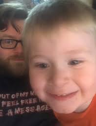 Is there a cell phone near his head right now?