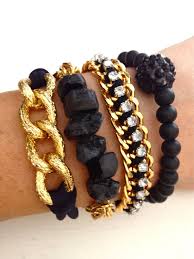 Black And Gold Jewelry Stand Gold And Black Arm Candy Stack By Dann Arm Candy Bracelets Black Gold Jewelry Jewelry Inspiration
