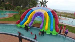 There's free parking and an airport shuttle for a fee. Taman Tema Kolam Air Sempoi Di De Rhu Beach Resort