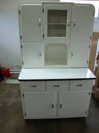 White Kitchen Hoosier Pull Out Enamel Top Table Has Flour Sifter Metal Drawer And All The Origin Hoosier Cabinet Kitchen Cabinet Styles Retro Pink Kitchens