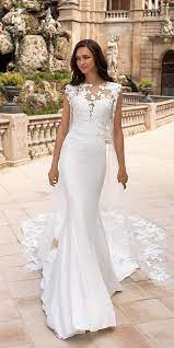 24 Trumpet Wedding Dresses That Are Fancy Romantic Wedding Dresses Guide Cape Wedding Dress Wedding Dress Guide Wedding Dresses