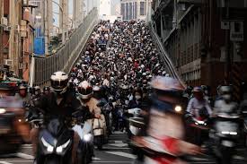 Rush hour creates river of scooters down Taipei's 'Scooter Waterfall' -  April 22, 2026 | Reuters