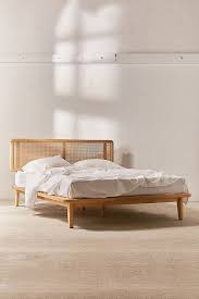 this rattan decor line is so popular that urban outfitters can t keep it stocked platform bed designs futon bed frames queen size bed frames