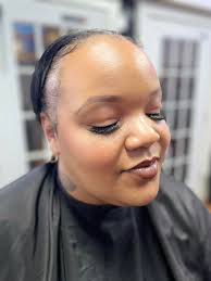 Who can recommend a natural makeup artist for a wedding?