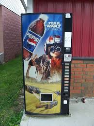 While this hack won't get you any free soda, you might, at the very least. Promotional Star Wars Episode One Pepsi Vending Machine Flickr
