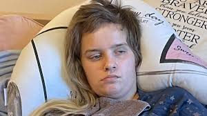 Angel Lynn: Woman paralysed after falling from van during kidnap stands for  the first time