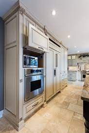 We use cookies on this website. Winnipeg Manitoba Canada Dark Brown Kitchen Cabinets Traditional With Decorative Columns Sinks Two Toned Island
