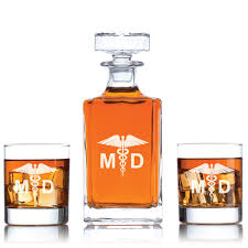 Perfect for whisky, scotch, & bourbon, a personalized whiskey decanter engraved with the phrase of your choice makes an excellent gift idea. Caduceus Personalized Decanter Set For Doctors Liquor Decanter Set Working Professional Office Gifts Promotional Products Custom Gifts Party Favors Corporate Gifts Personalized Gifts