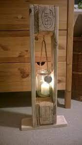 Simple tea candle holders made from pallets. Palettes Chandeliers Diy Diy Palette Chandeliers Woodwork Design Diy Chandelier Diy Candle Sticks Diy Furniture Making
