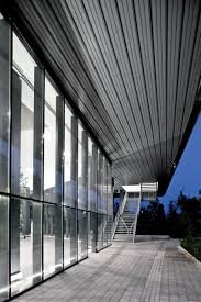 Why Keep Your Vision Locked Inside Bring Style Outdoors With Hunter Douglas Exterior Ceilings These Panels Are Attached To Rig Metal Ceiling Exterior Ceiling