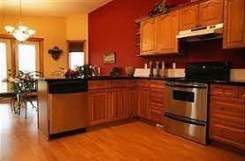 Tired of wall paper, looking for a nice neutral color that will be fresh. How To Update Oak Kitchen Without Painting Cabinets Red Kitchen Walls Kitchen Colors Kitchen Wall Colors
