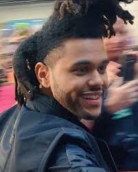 The Weeknd said that his old hair style caused him to frequently have neck  pains, and that his plan was to cut it once it affected his vision in day  to day