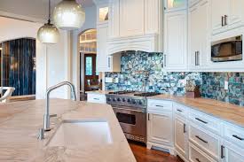 Adding a pop of color to an all white kitchen in the form of a colorful backsplash is a great way to make a statement and inject some fun into your space. White Kitchen With Blue Backsplash Hgtv