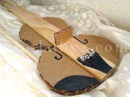 After that, measure your pegs and drill the same size hole around where it is marked on your template and glue it in. As Promised Here Is How To Make A Cardboard Violin I Didn T Find Such A Tutorial Online So I Decided To Make One If You R Violin Violin Tutorial Violin Diy