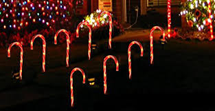 Candy cane lane lights up from thanksgiving through new year's. Amazon Com Tqs 10 Pack Christmas Pathway Lights 22 Candy Cane Lights Pre Lit With 5 Tungsten Bulbs Per Candy Cane Light Decor Outdoor Christmas Candy Cane Pathway Markers Decorations Candy Cane Pathway Lights