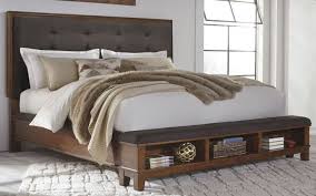 Cosmoliving elizabeth upholstered bed with storage—coming in hot! Ralene Dark Brown Cal King Upholstered Storage Panel Bed From Ashley Coleman Furniture