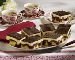 Klassische Donauwellen Mit Kirschen Und Buttercreme Rezept Buttercreme Rezept Kuchen Und Torten Donauwelle Rezept