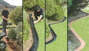 Wood beams and raised flower beds are the way to go for this garden edge idea. Snap It Garden Edging