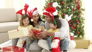 It showcases your favorite family recipes and makes an ideal present for parents who love to host their growing family. Family Opening Christmas Gifts At Stock Footage Video 100 Royalty Free 597421 Shutterstock