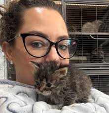 Cranberry loves being cuddled and picked up