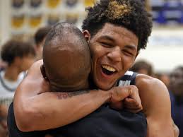 Hoban boys basketball rallies to win Copley regional semifinal