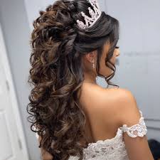 Look through a bunch of ideas of hairstyles that you can choose for your quinceanera, including potential updos, how to handle curls, and how to incorporate your crown or tiara. Half Up Half Down Quinceanera Hairstyles Quince Hairstyles Hair Styles Long Hair Styles