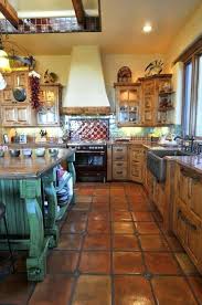 In some cases referred to as spanish revival cooking areas, these areas are filled with traditional interior design aspects, warm abundant details, dark wood cabinets and painted tile work. 13 Beautiful Spanish Style Kitchen Ideas