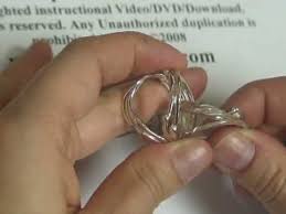 Slide one ring through the p loop of the other ring to reset the puzzle. Pin On More Jewlery