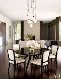The clean lines are complemented by some subtle curves in the furniture. 19 Statement Making Chandeliers Architectural Digest