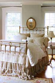 With a rich antique brass patina finish which requires the minimum of care but will give lifelong pleasure and visual appeal to complement even the most demanding of bedroom themes. Charming Iron Bed Ideas Tips Artisan Crafted Iron Furnishings And Decor Blog Neutral Bedroom Design Home Decor Beautiful Bedding