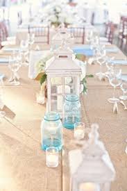40 Amazing Beach Wedding Centerpieces Weddingomania Beach Wedding Decorations Beach Wedding Reception Beach Wedding Table Settings