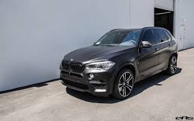 The paintwork in bmw individual special frozen black metallic provides a powerful presence and an striking contrast to the red accents. Matte Black Bmw X5 M With Some Aftermarket Goodies